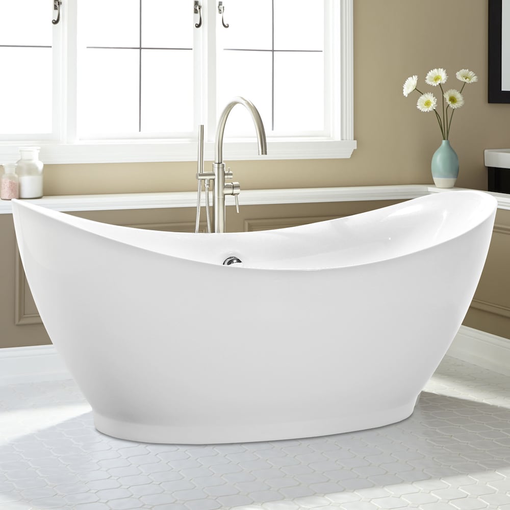 Freestanding acrylic bathtub with polished chrome round overflow and pop-up drain. 6513