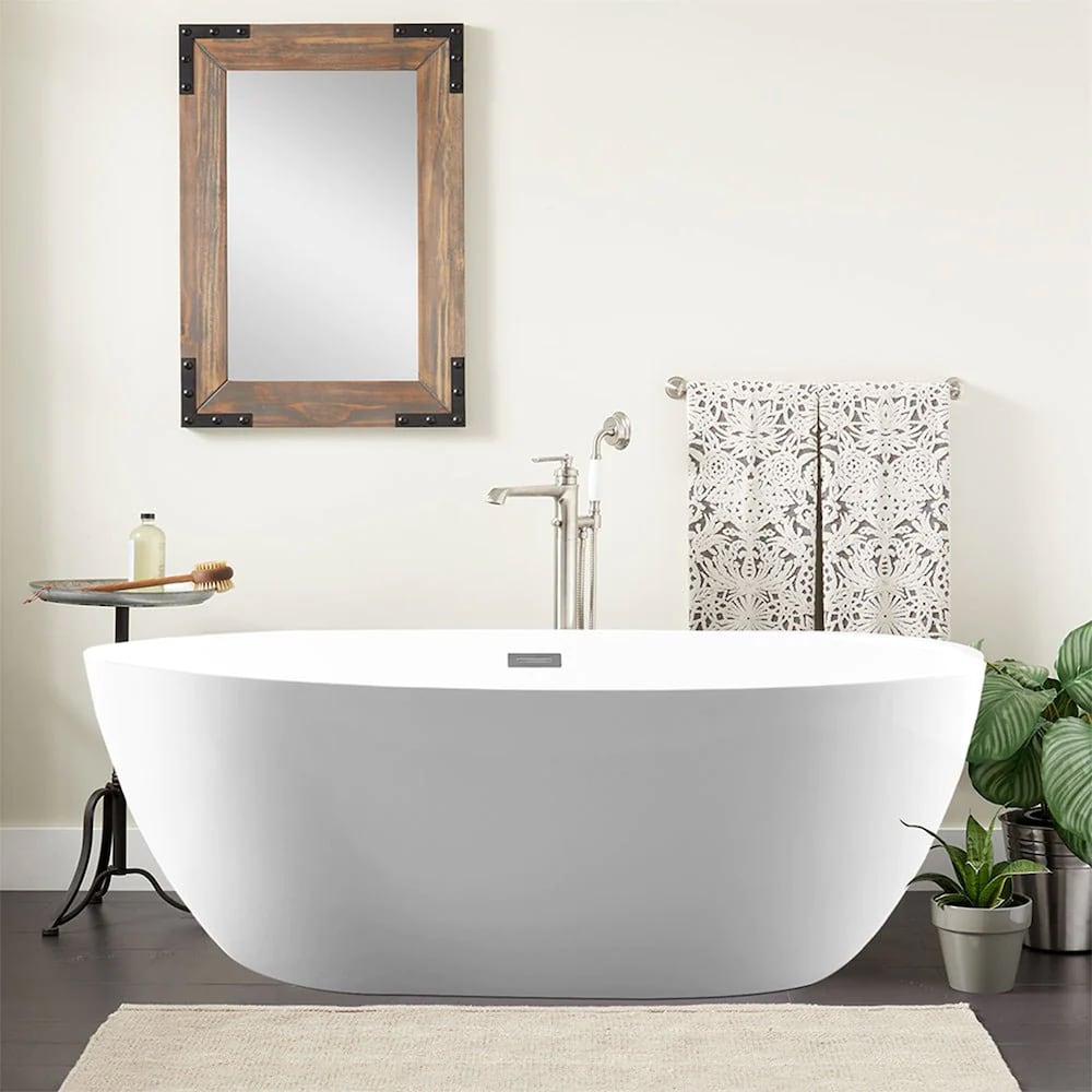 Freestanding acrylic bathtub with polished chrome slotted overflow and pop-up drain. 6834