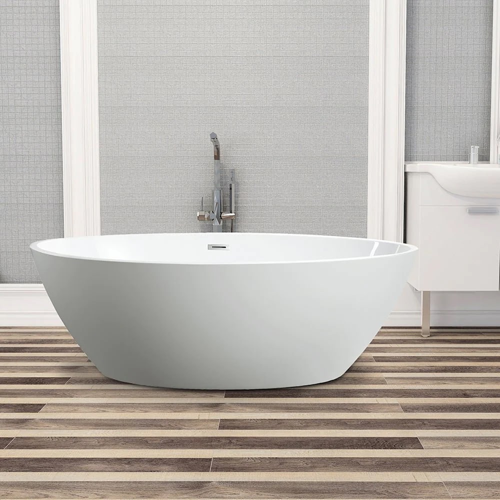 Freestanding acrylic bathtub with polished chrome slotted overflow and pop-up drain. 6834