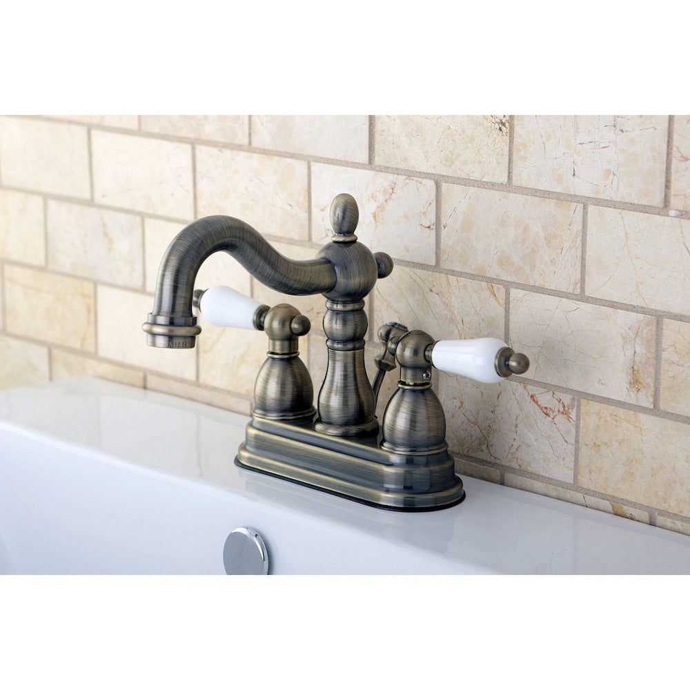 Victorian Porcelain Lever 4 in. Centerset 2-Handle Bathroom Faucet in Vintage Brass