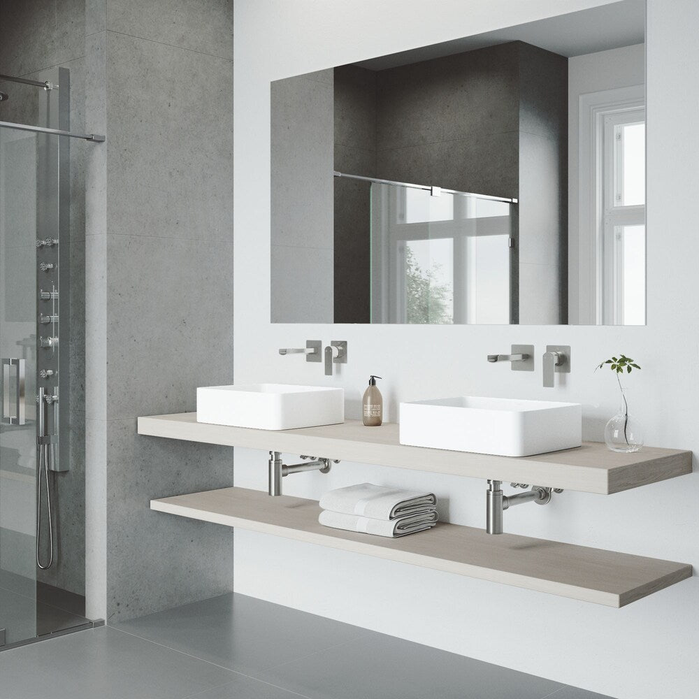 Robinet de salle de bain mural à poignée unique Atticus en nickel brossé