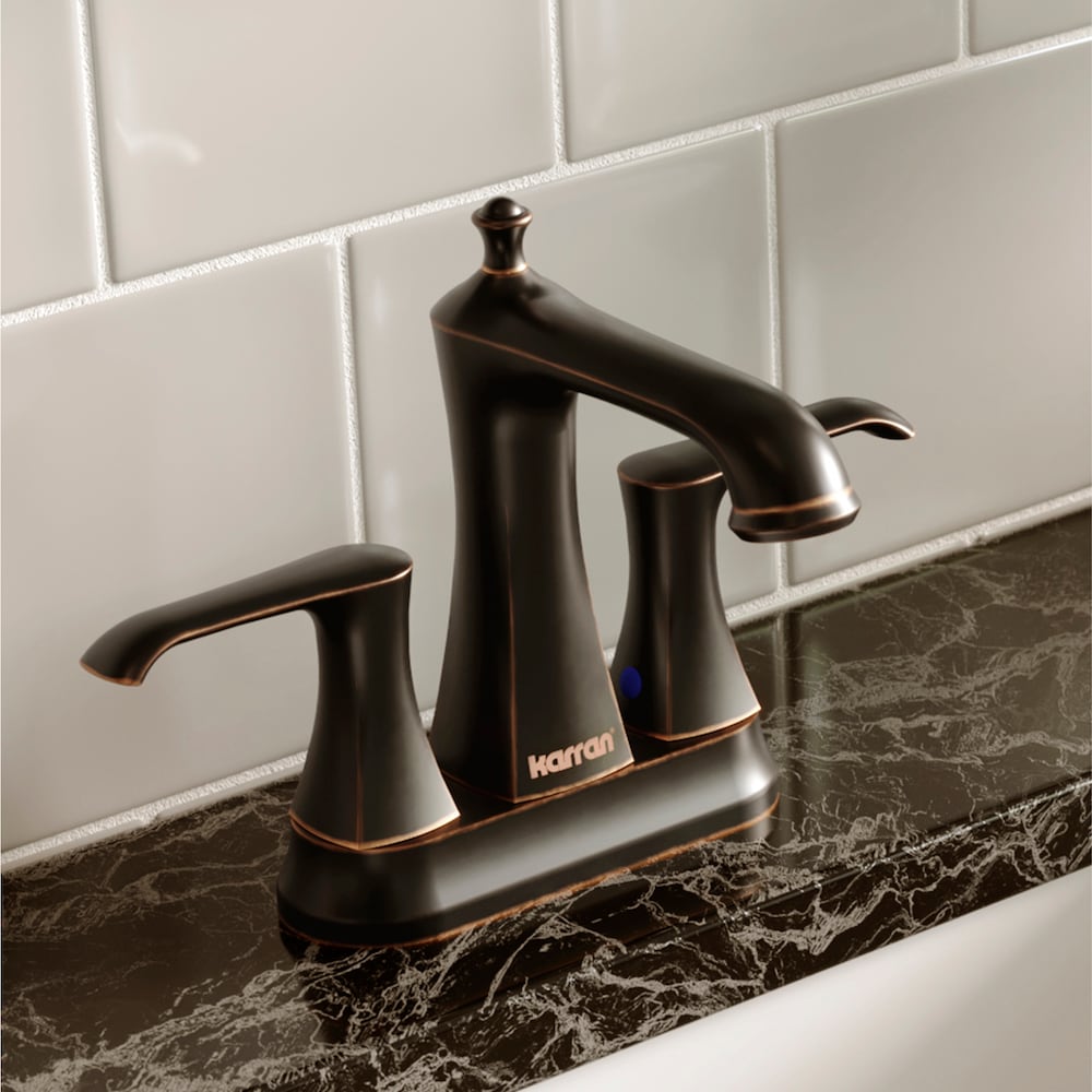 Woodburn Two-Hole 2-Handle Bathroom Faucet with Matching Pop-Up Drain in Oil Rubbed Bronze