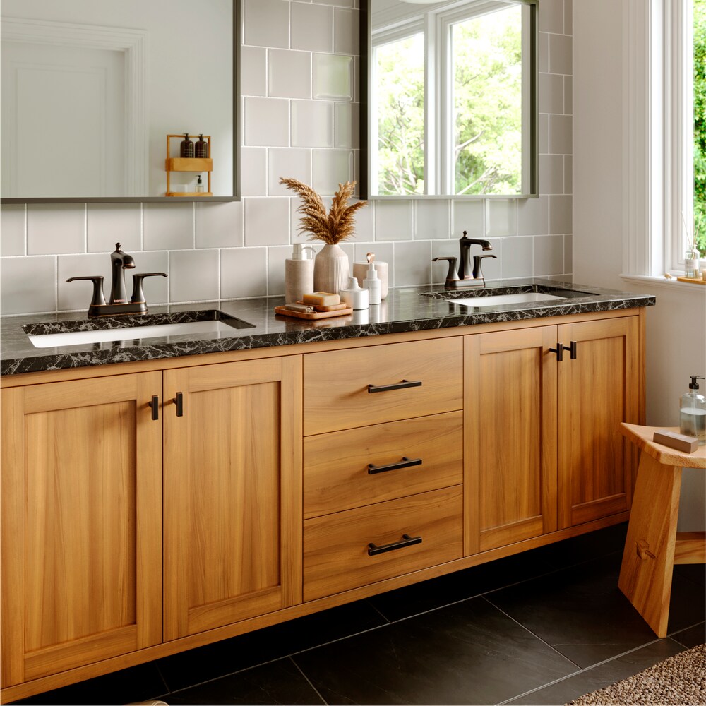 Woodburn Two-Hole 2-Handle Bathroom Faucet with Matching Pop-Up Drain in Oil Rubbed Bronze