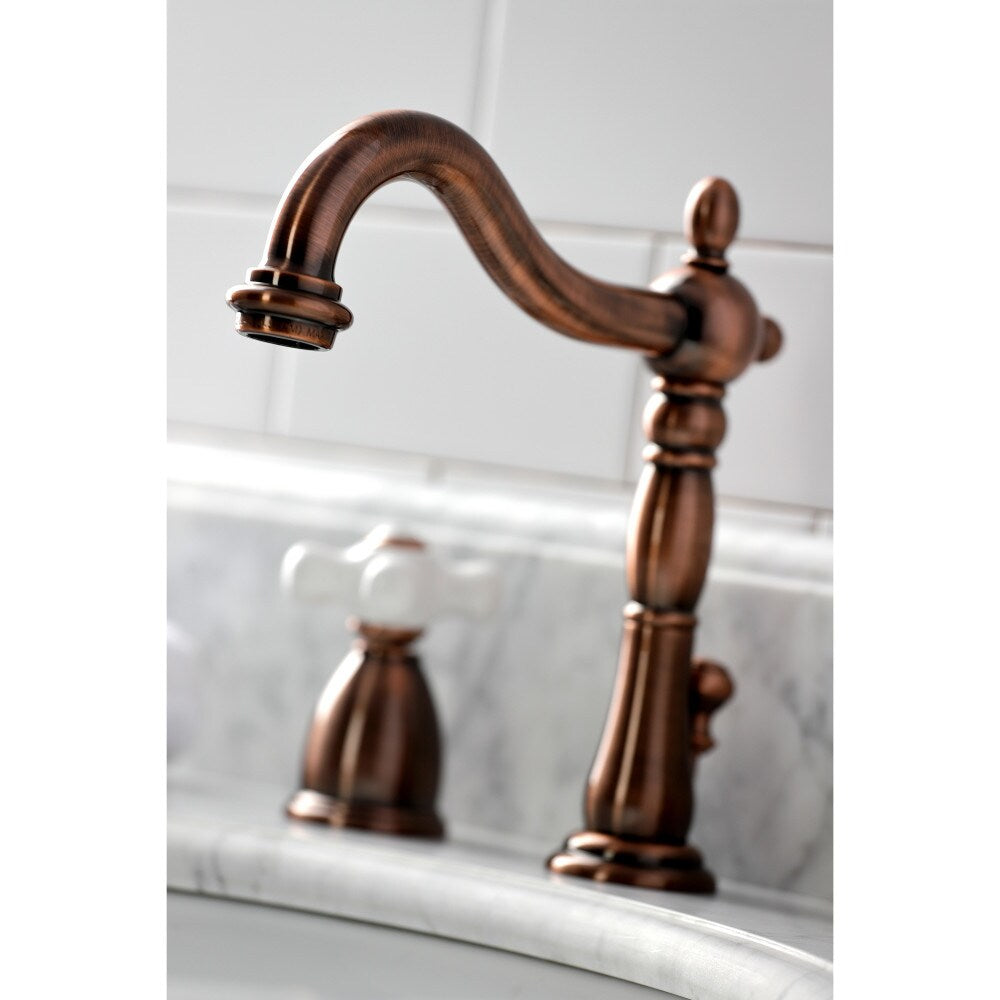 Heritage Porcelain Cross 8 inch Widespread 2-Handle Bathroom Faucet in Antique Copper