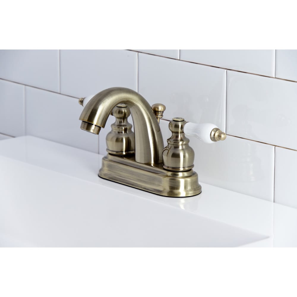 Traditional 4 inch Centerset 2-Handle Bathroom Faucet in Antique Brass
