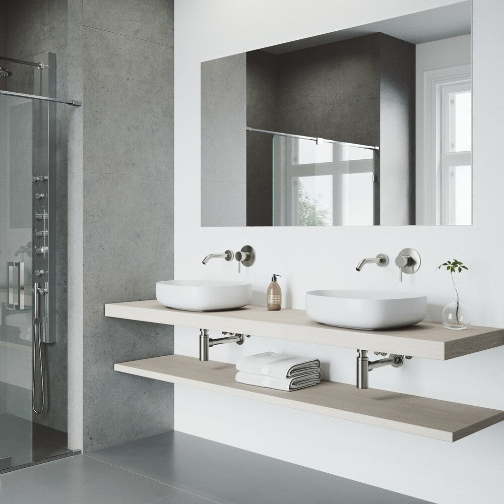 Robinet de salle de bain mural à poignée unique Olus en nickel brossé