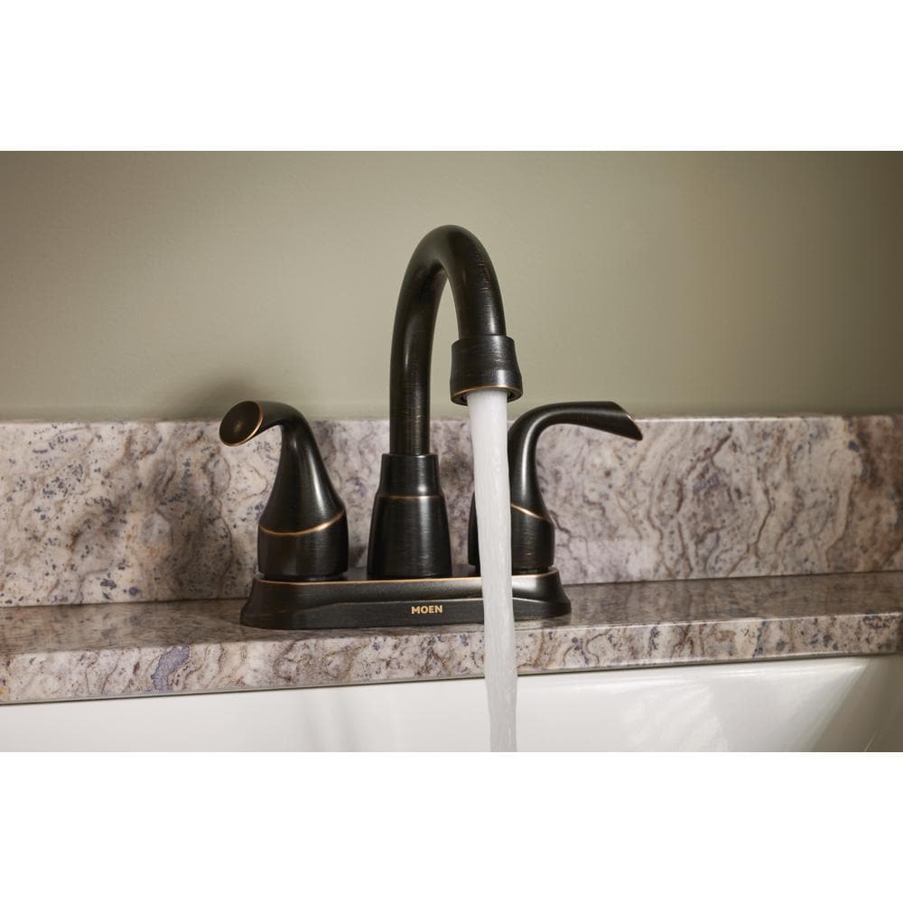 Robinet de lavabo de salle de bain central Idora à 2 poignées de 4 pouces en bronze méditerranéen (drain et valve inclus)