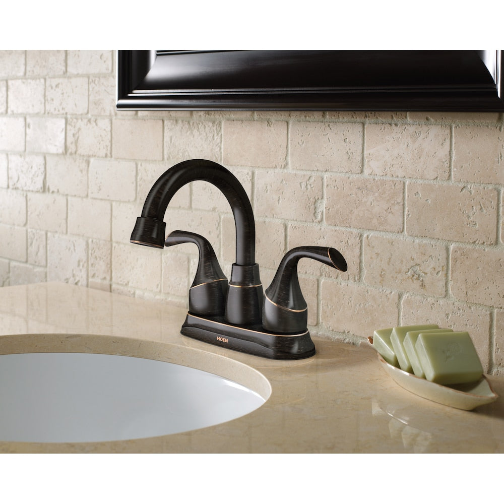 Robinet de lavabo de salle de bain central Idora à 2 poignées de 4 pouces en bronze méditerranéen (drain et valve inclus)