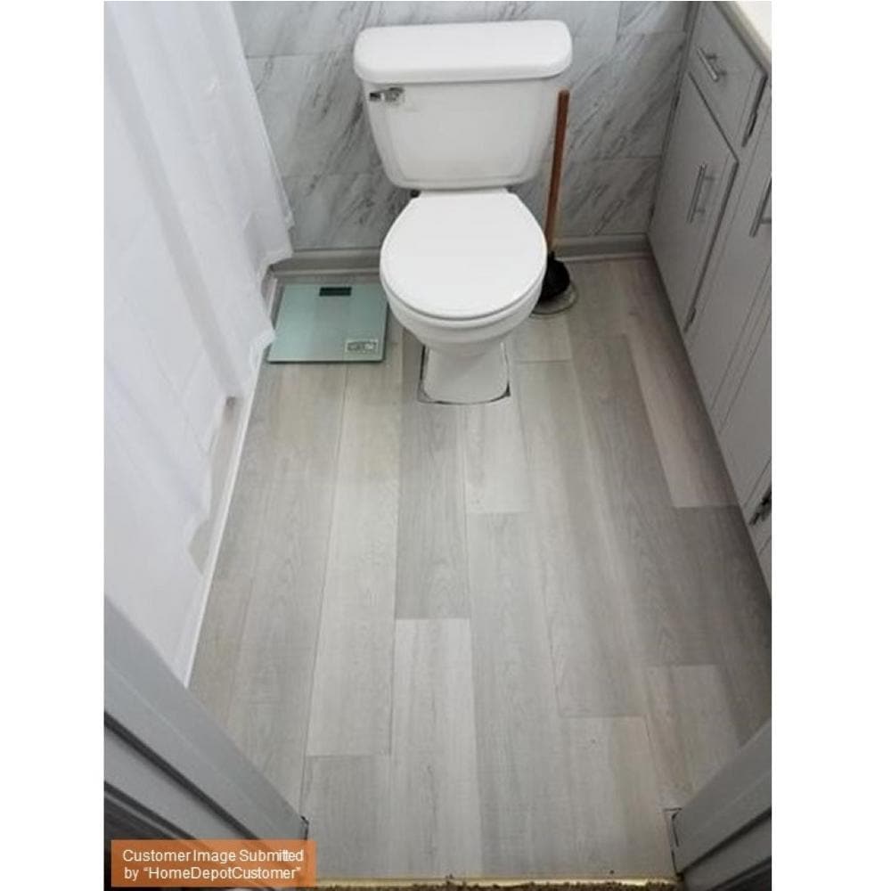 Sandpiper Oak 3.8mm x 6 in. W x 36 in. L 4MIL GripStrip Water Resistant Luxury Vinyl Plank Flooring (24 sq.ft./case)