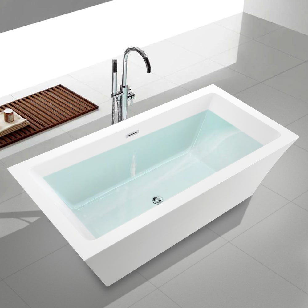 Baignoire autoportante en acrylique avec trop-plein à fentes en chrome poli et bonde escamotable. 6817-L