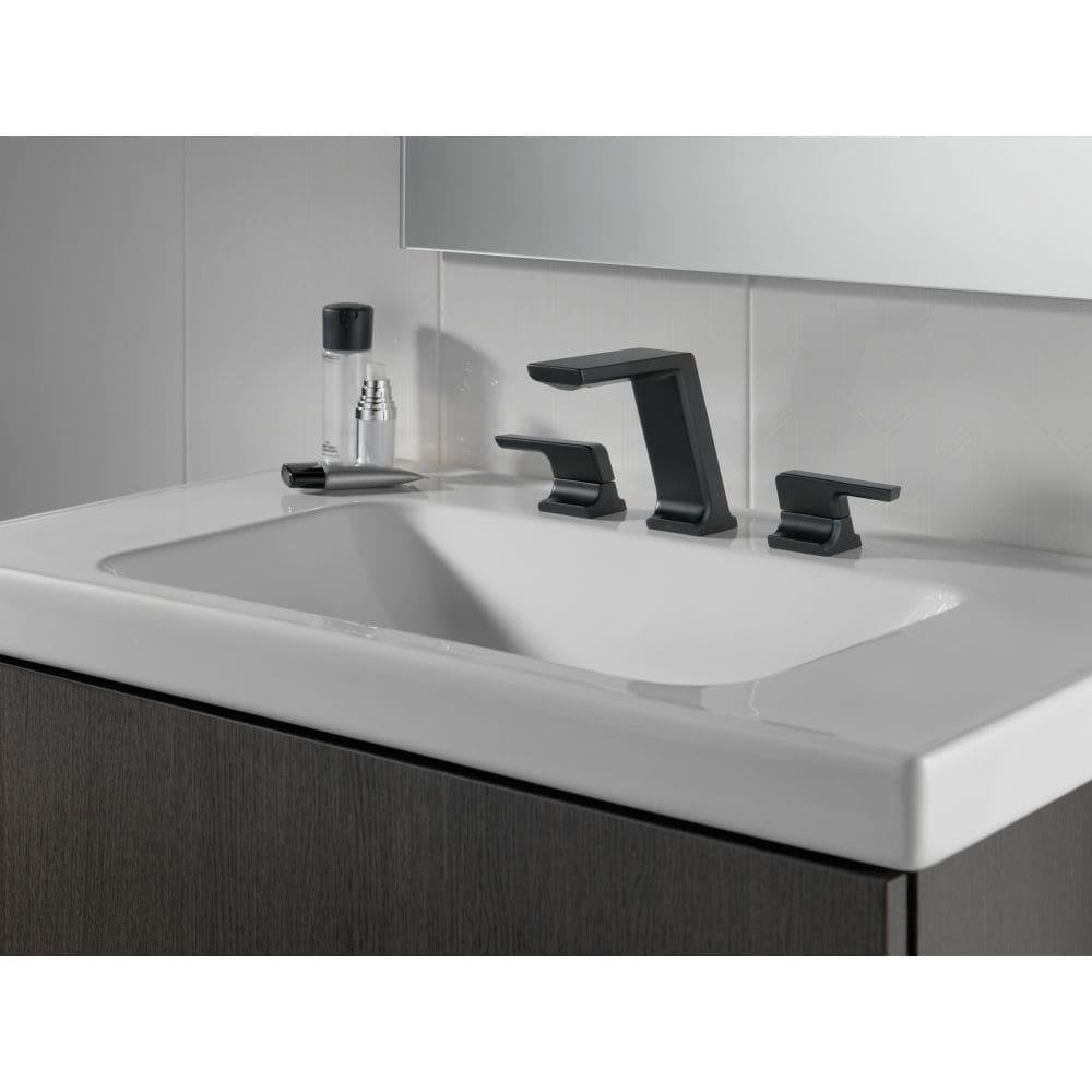 Robinet de lavabo pivotant à deux poignées avec bec escamotable en métal noir mat