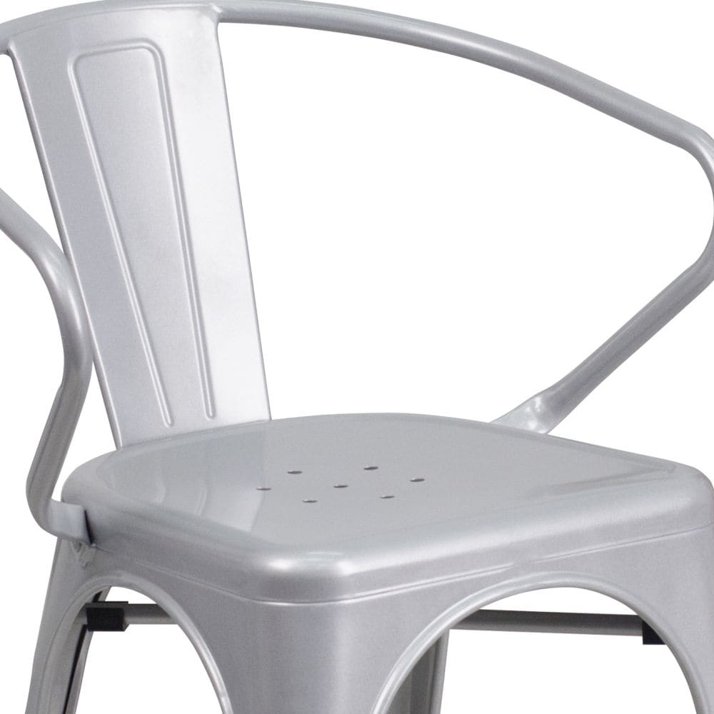 Chaise en métal argenté avec accoudoirs