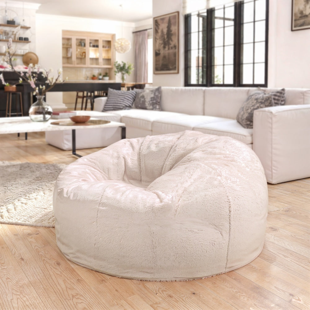 Pouf en fourrure blanche
