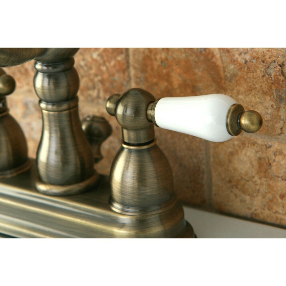Victorian Porcelain Lever 4 in. Centerset 2-Handle Bathroom Faucet in Vintage Brass