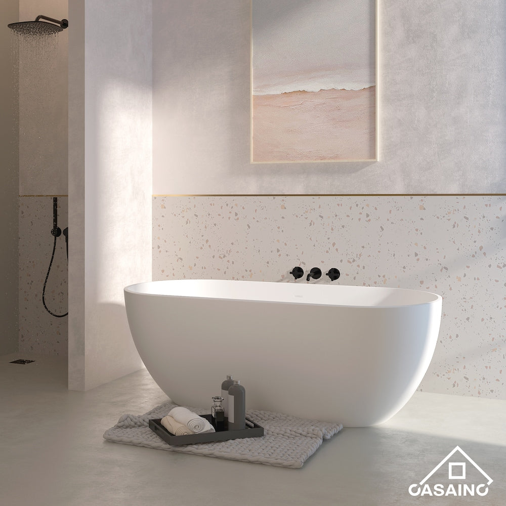 Baignoire ovale autoportante en surface solide de 59 pouces avec drain central en blanc