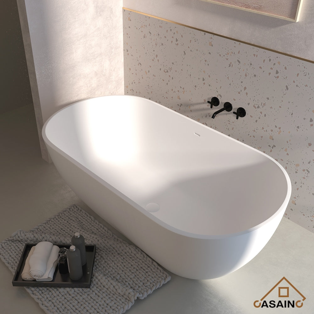 Baignoire ovale autoportante en surface solide de 59 pouces avec drain central en blanc