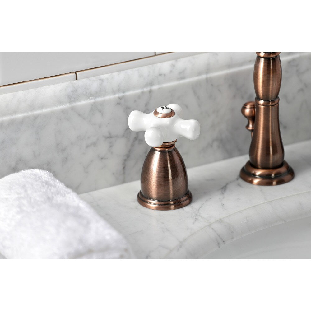 Heritage Porcelain Cross 8 inch Widespread 2-Handle Bathroom Faucet in Antique Copper