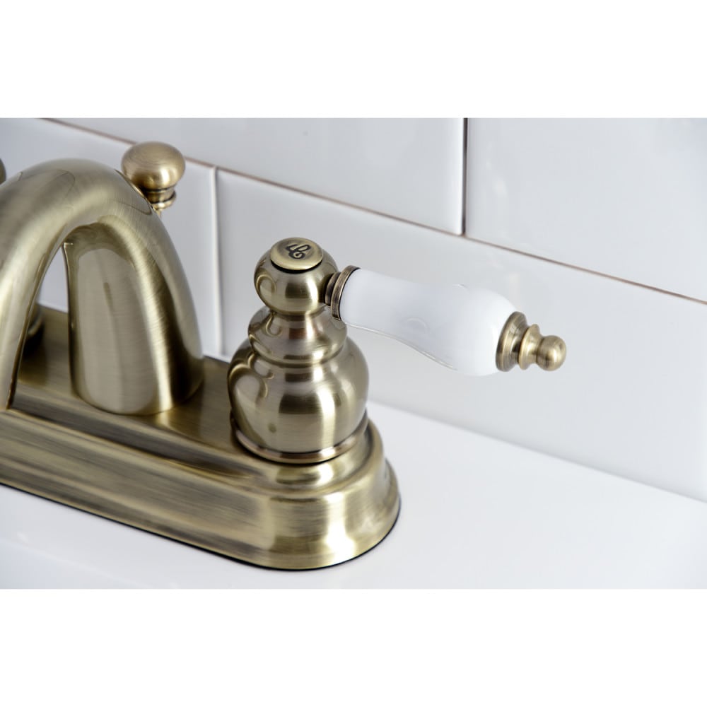 Traditional 4 inch Centerset 2-Handle Bathroom Faucet in Antique Brass