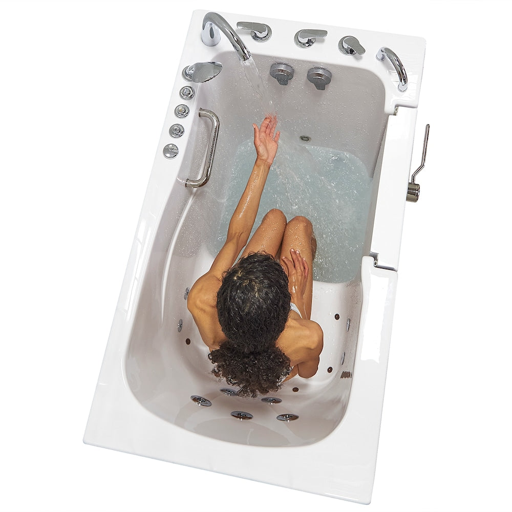 Baignoire à accès direct Capri de 4 pi 4 po à double drain et bain à remous avec siège chauffant et bain à remous à droite en blanc