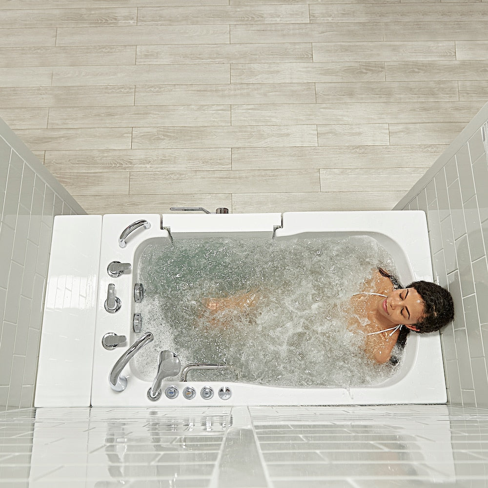 Baignoire à accès direct Capri de 4 pi 4 po à double drain et bain à remous avec siège chauffant et bain à remous à droite en blanc