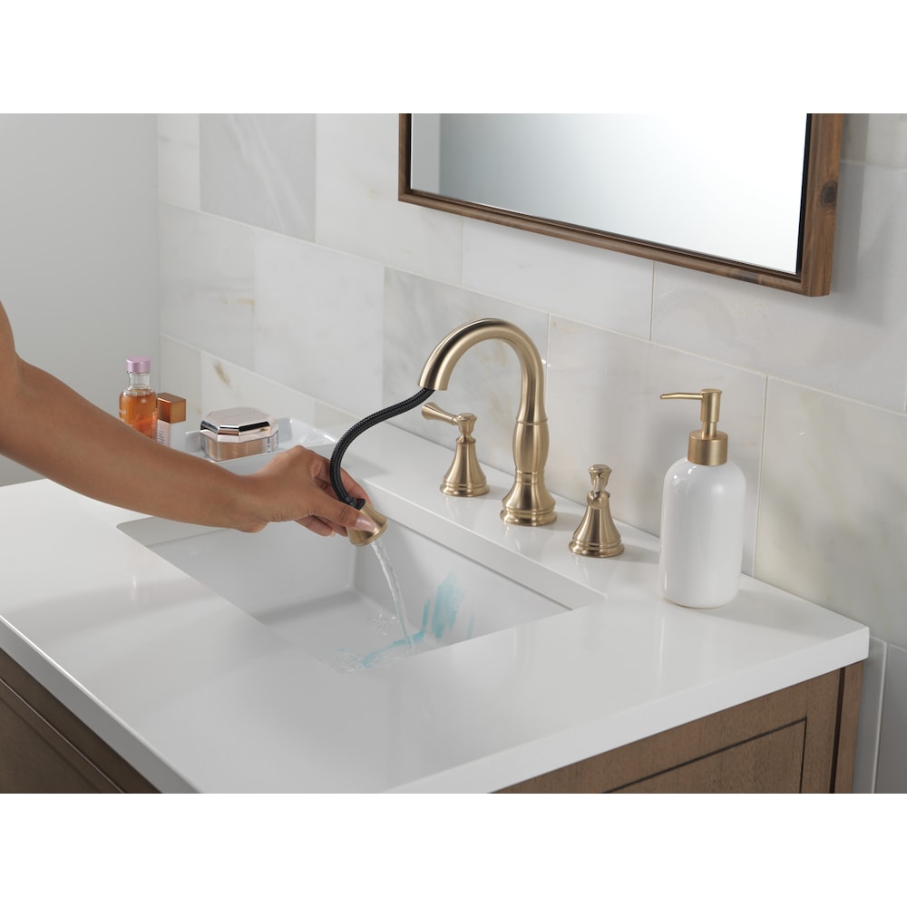 Robinet de salle de bain à deux poignées et à large bec rétractable Cassidy de 8 po en bronze champagne