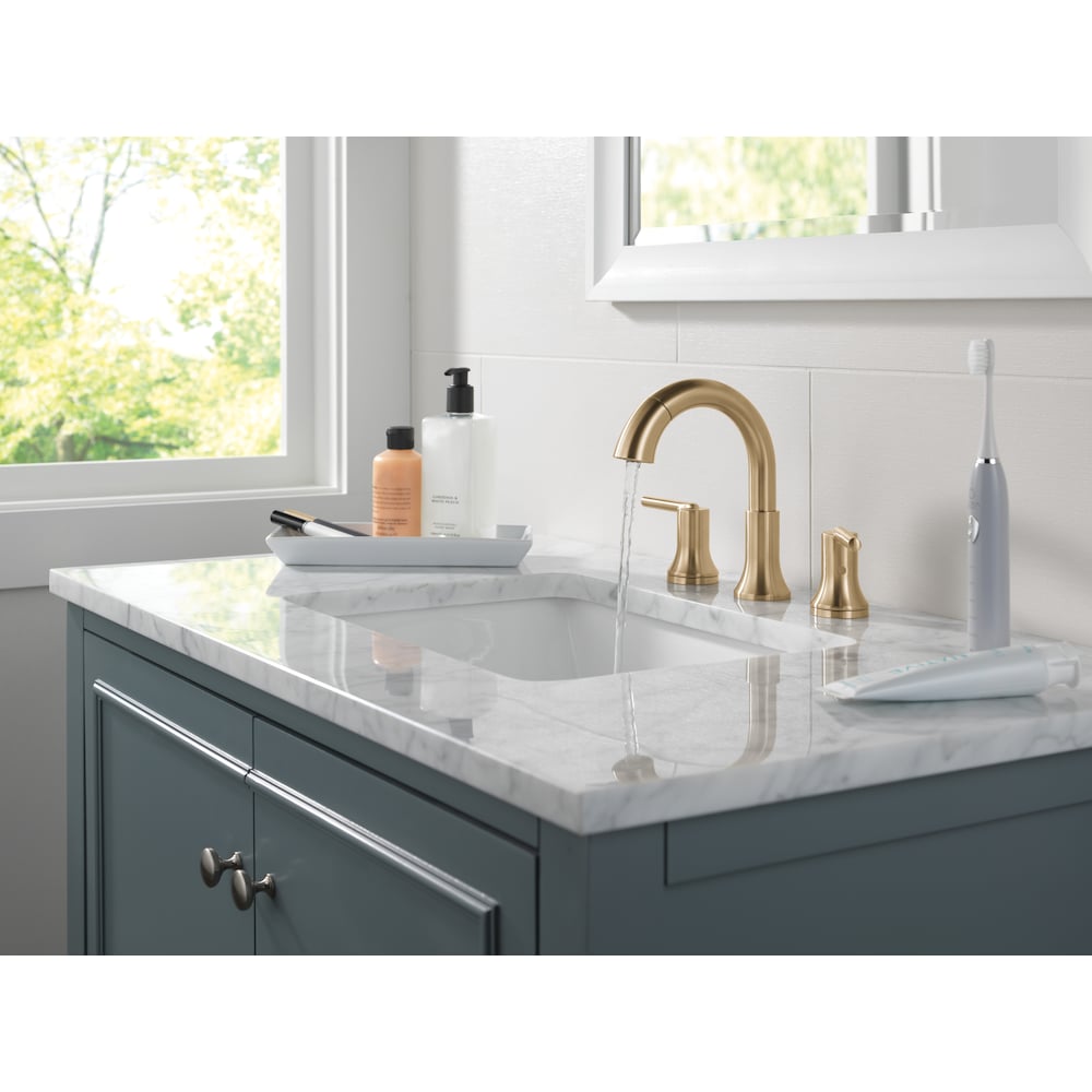 Robinet de salle de bain à deux poignées et à bec rétractable Trinsic de 8 po en bronze champagne