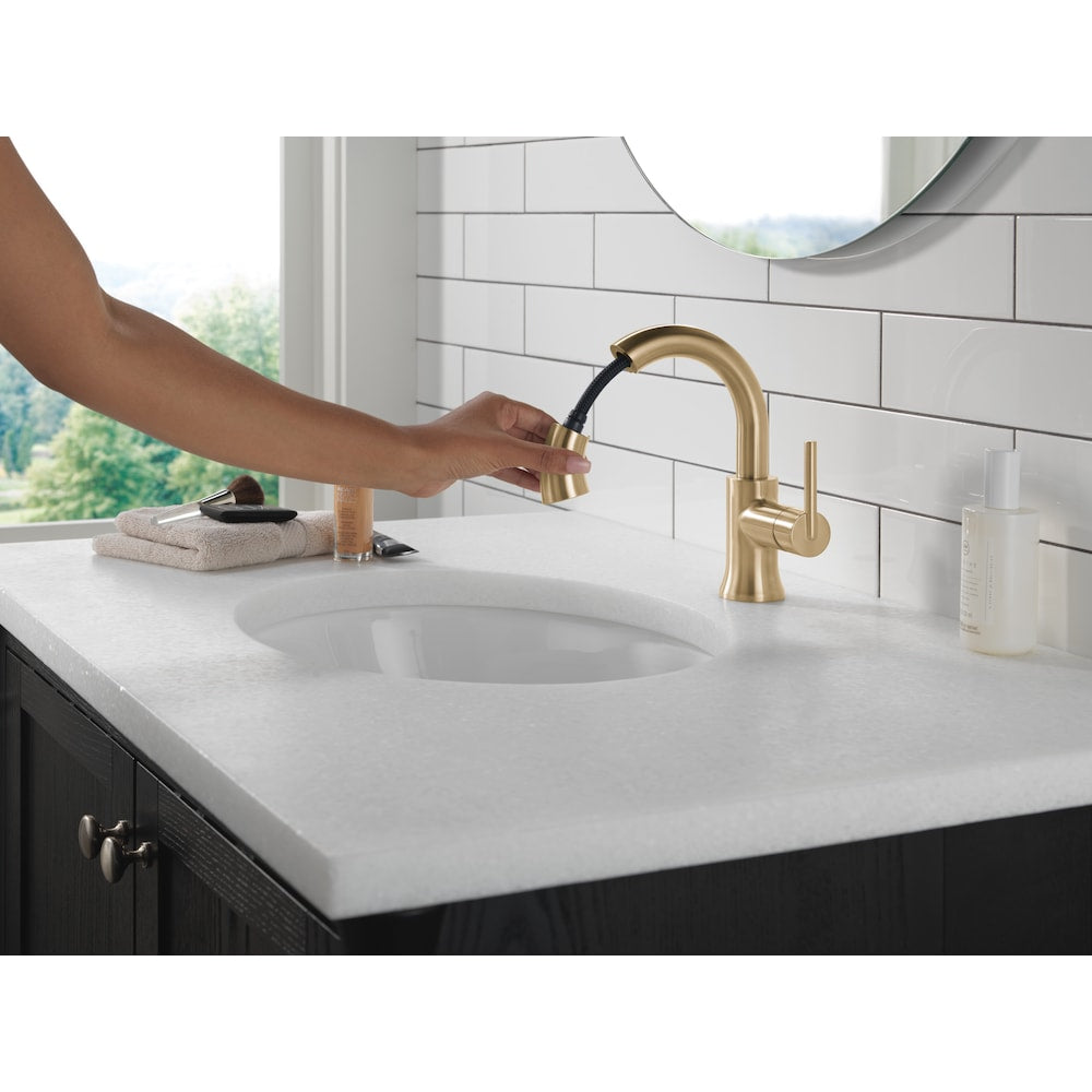 Robinet de salle de bain à poignée unique et à trou unique Trinsic avec bec rétractable en bronze champagne