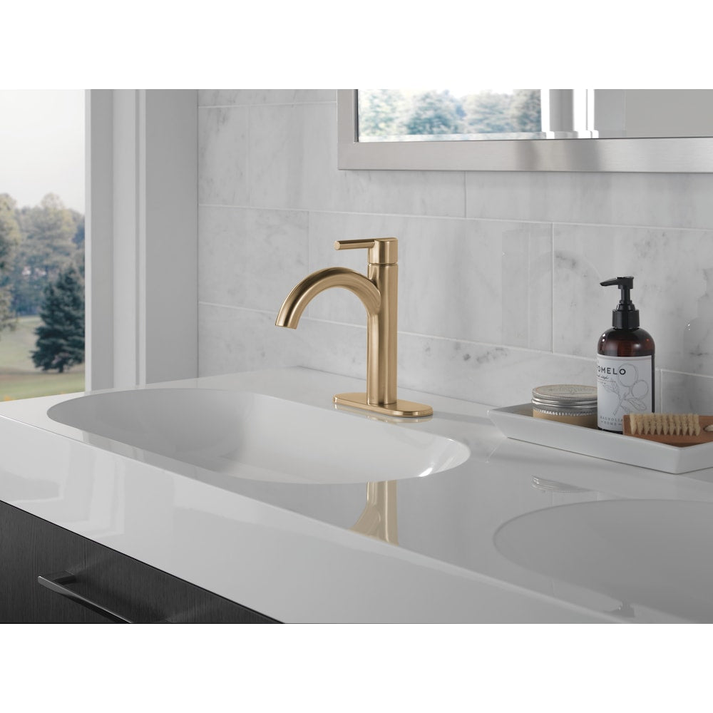 Robinet de salle de bain monotrou à bec en J Nicoli à poignée unique en bronze champagne