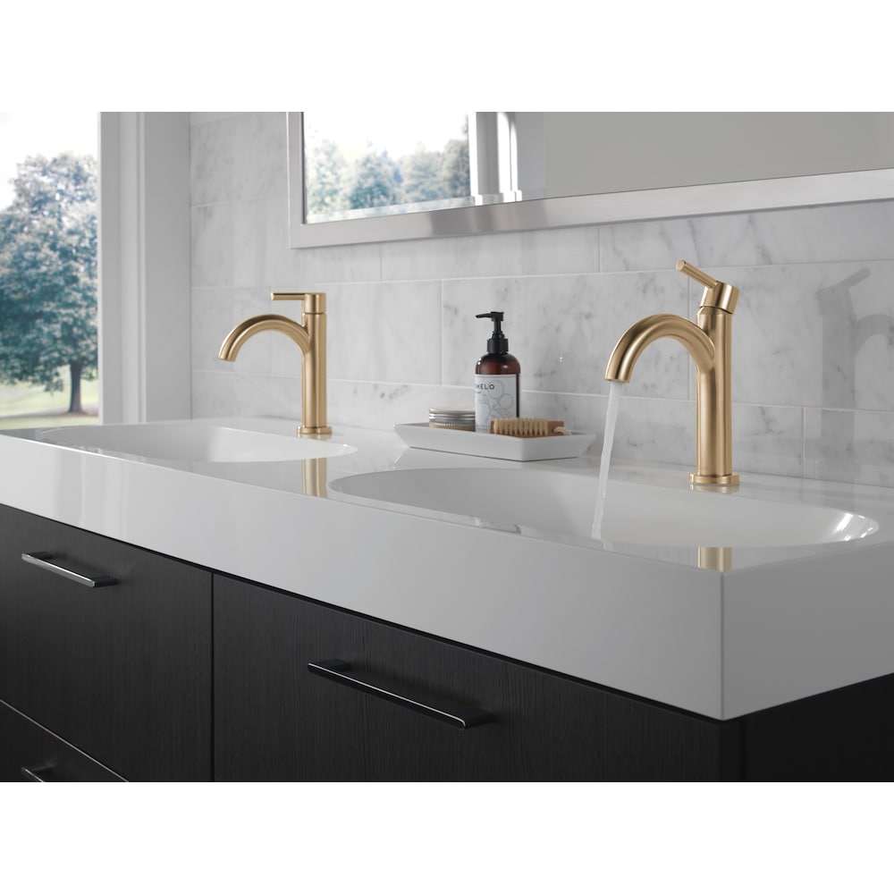 Robinet de salle de bain monotrou à bec en J Nicoli à poignée unique en bronze champagne